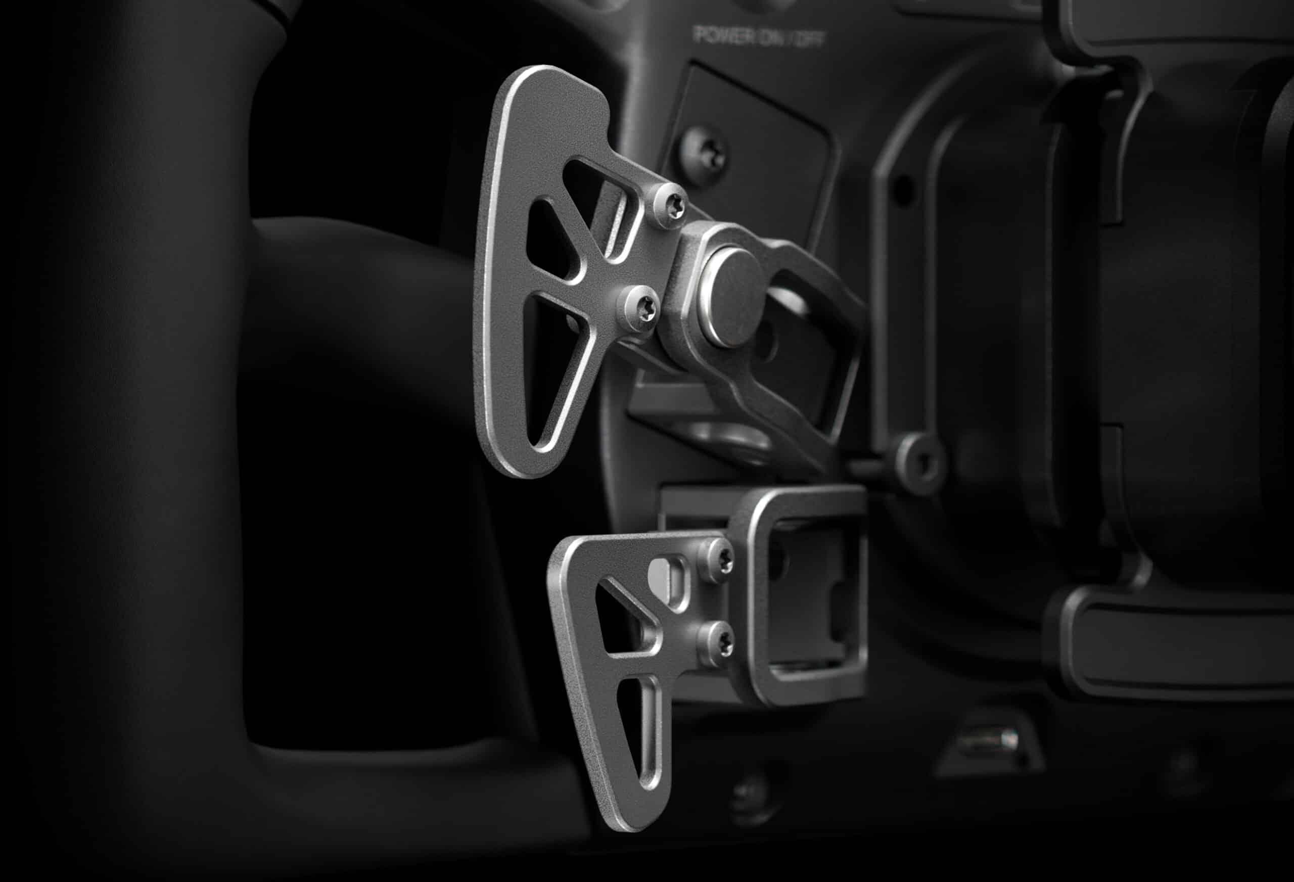 Simucube Savu shifter paddles close-up - responsive tactile action