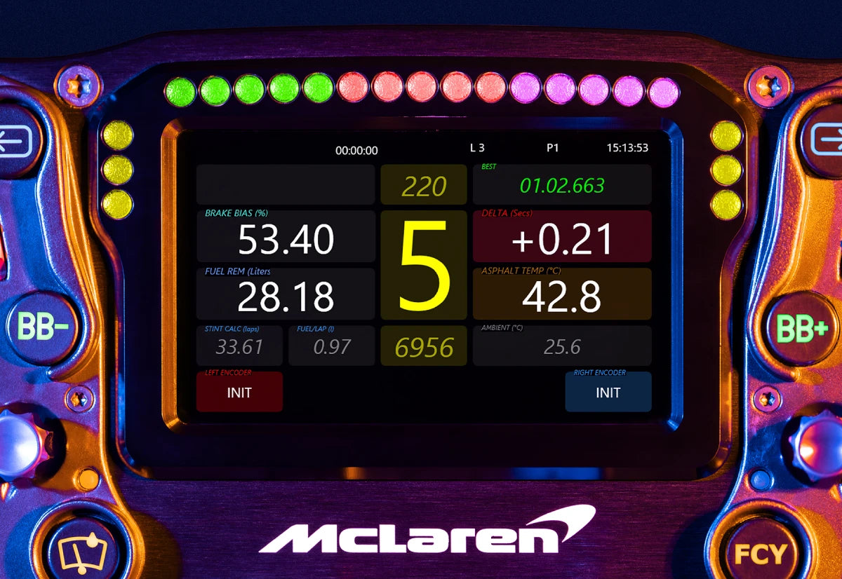 Close-up of a McLaren racing car digital dashboard display showing various data metrics in vibrant lights.