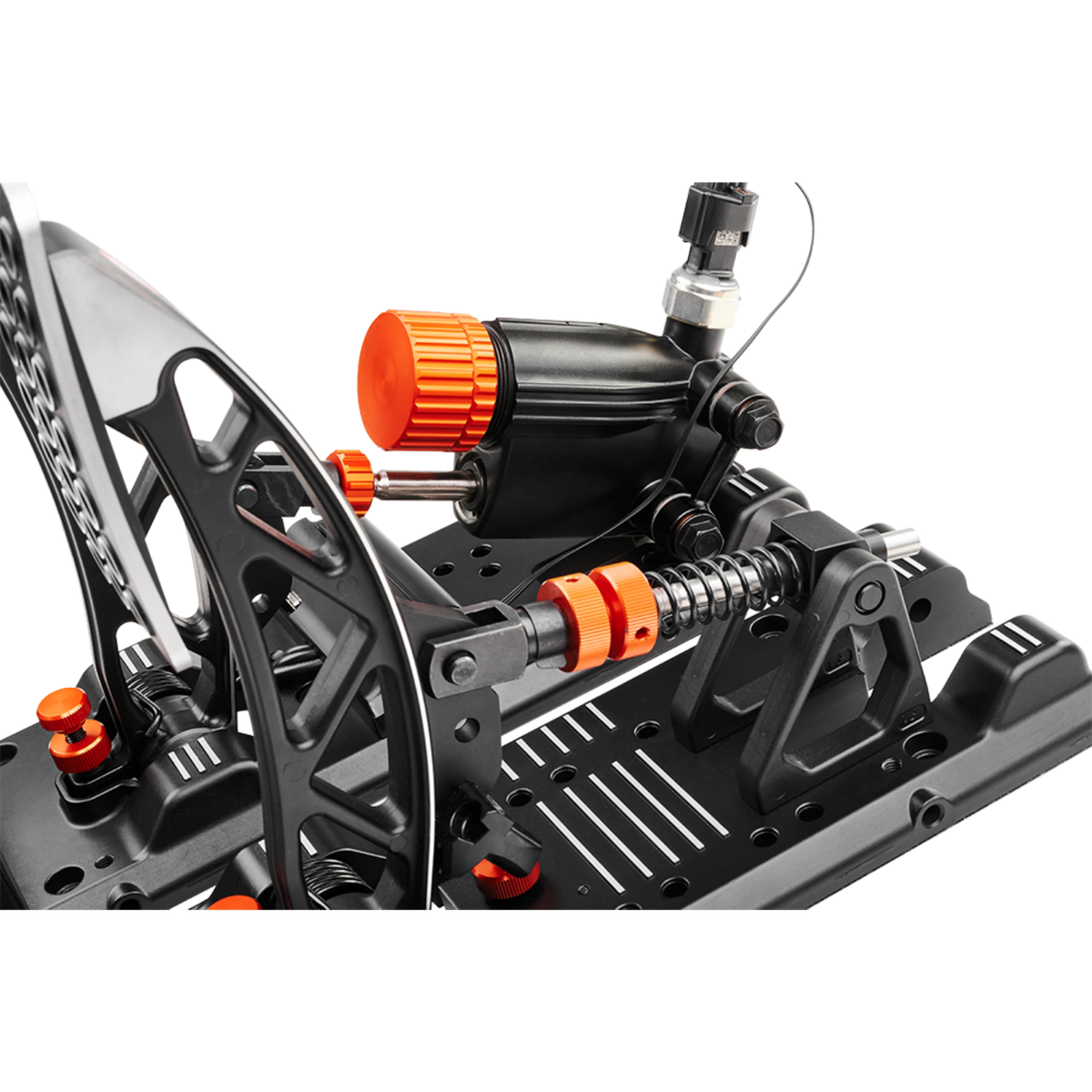 Close-up of a high-performance RC car suspension system with black and orange components.