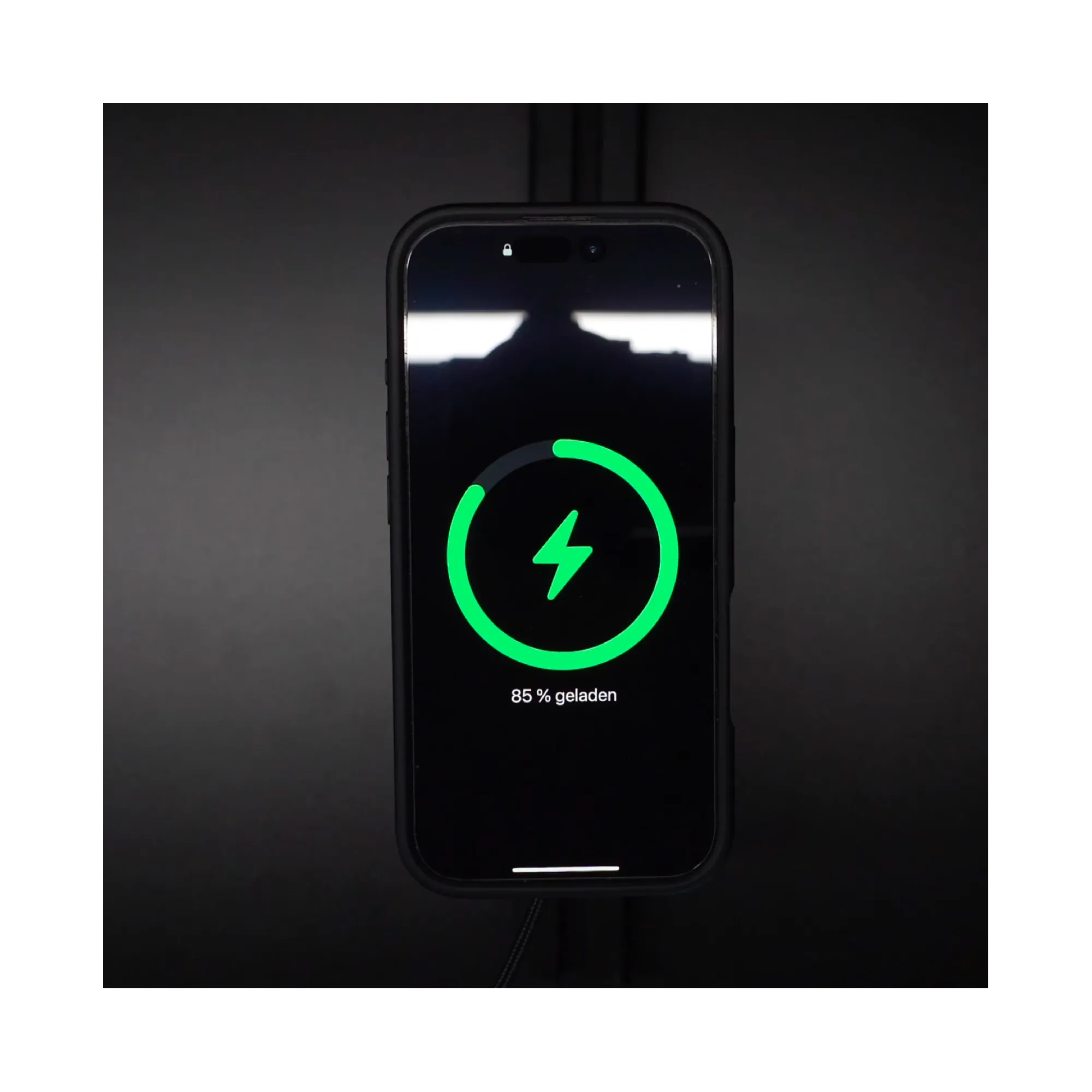 BavarianSimTec PitPower MagLock in use with iPhone, displaying charging status and MagSafe compatibility for seamless power on the go.