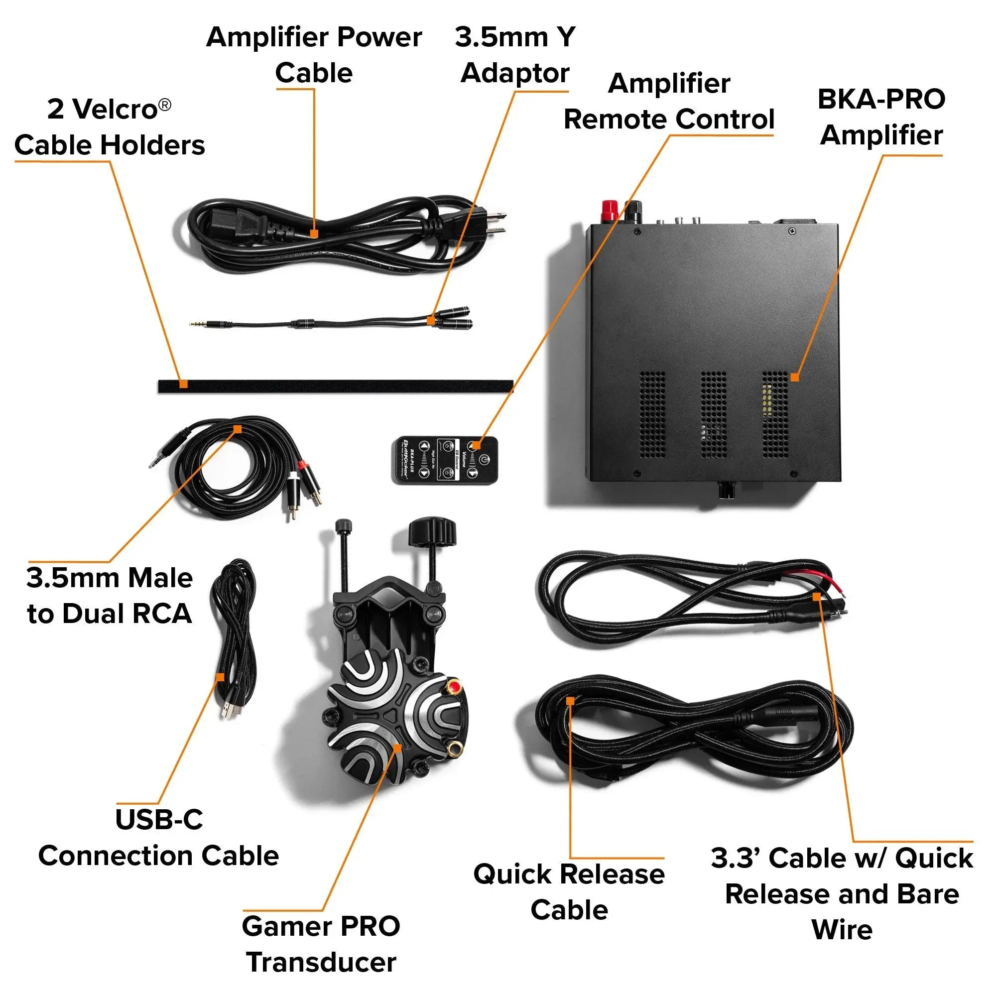 Components of the ButtKicker Gamer PRO haptic feedback system, including amplifier, transducer, cables, and accessories for sim rigs.