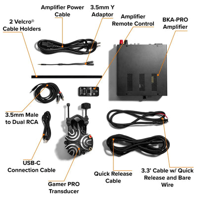 Components of the ButtKicker Gamer PRO haptic feedback system, including amplifier, transducer, cables, and accessories for sim rigs.