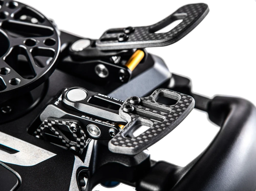 Close-up of a high-performance car racing pedal with carbon fiber detail, featuring advanced engineering and sleek design.
