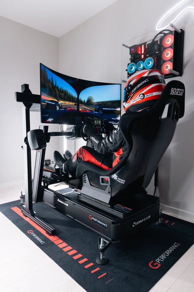 Sim racer using GPerformance SimRacing Carpet in a gaming setup with racing simulator, non-slip surface, and sound absorbing qualities.