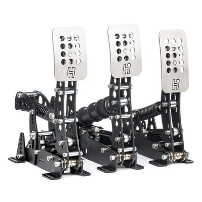 Heusinkveld Sim Pedals Ultimate+ showcasing adjustable pedal geometry and hydraulic damping for realistic racing simulation.