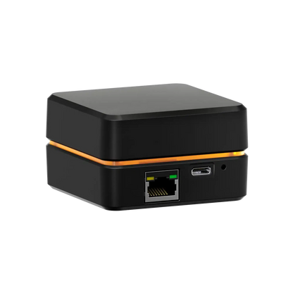 Simucube Link Hub device for connecting Simucube gear and wireless wheels via USB, protects against power surges.